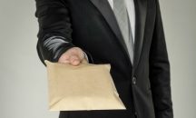 Film industry corporations were maintaining special cash slush funds for bribing officials.