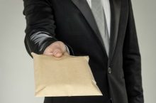 Film industry corporations were maintaining special cash slush funds for bribing officials.